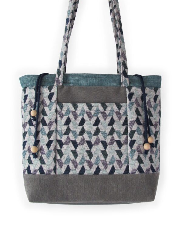 Bolso grande gris y morado delante